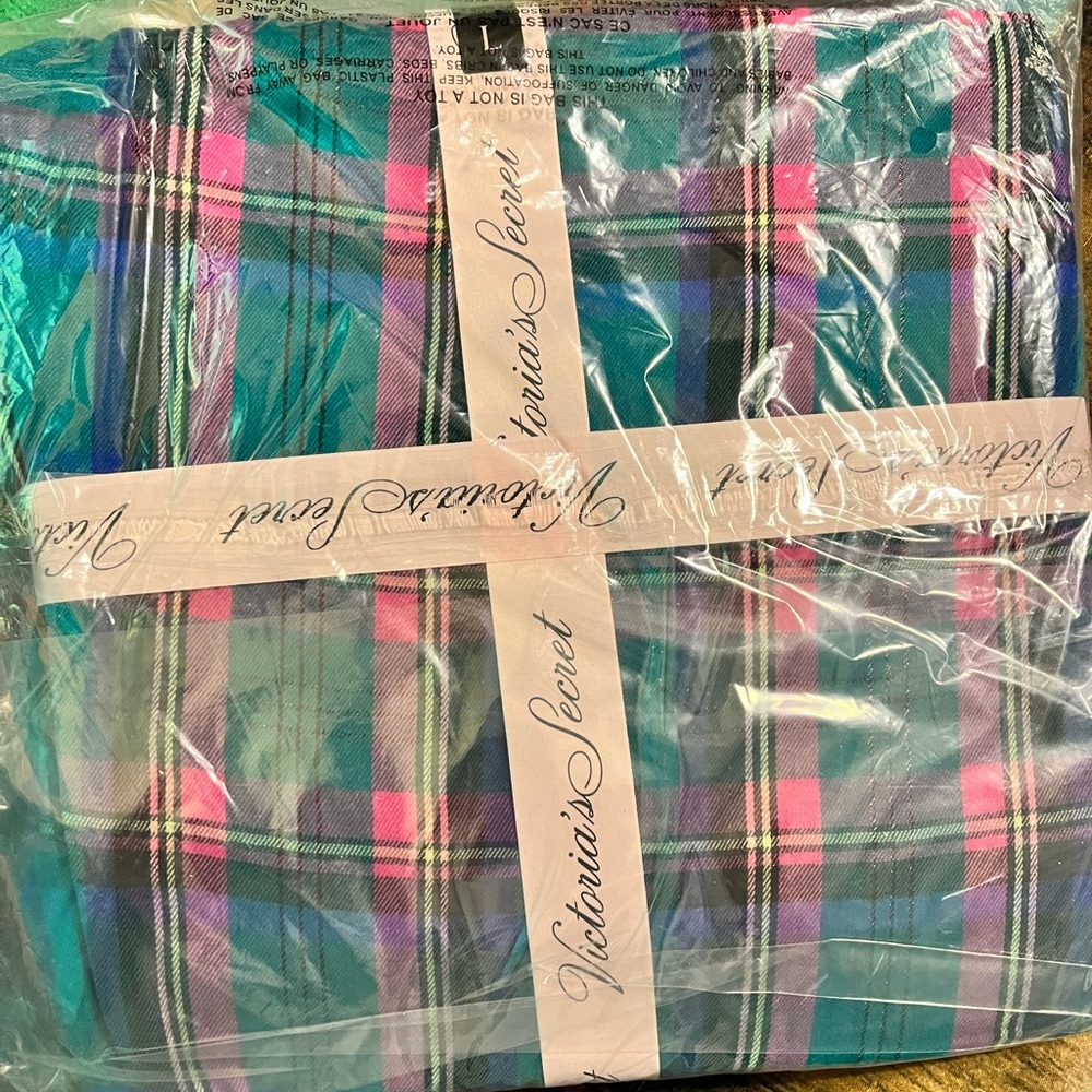 New Victoria Secret shirt and pajama pants. New tags. Still on!